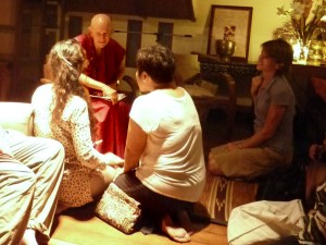 Anila chatting on Tibetan Buddhism with yogis in Bangkok